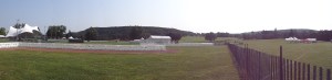 A panorama including the stage and the field, both of which will be full on Sunday